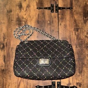 Karl Lagerfeld Paris Agyness shoulder bag featuring a black tweed exterior